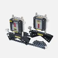 Two Easy-Laser XT440 alignment tools on black metal bases with chains.