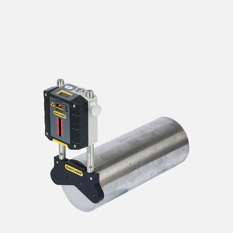 Laser level mounted on rods above cylindrical metal pipe with red laser line.