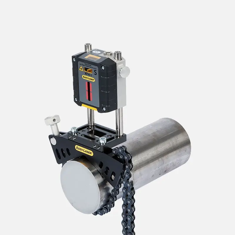 Laser unit mounted on metal cylinder with chain and bracket, projecting red line.