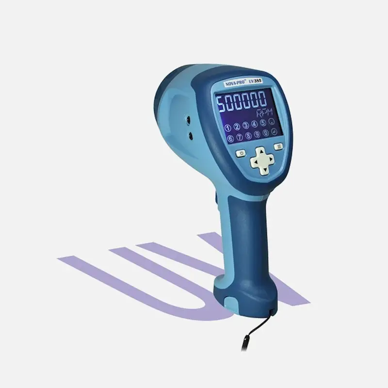 Handheld blue digital device displaying 500000, casting purple shadow with "UV" letters.
