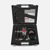 Black hard case with Sonotec Sonaphone Pocket device, headphones, probes, and manuals.