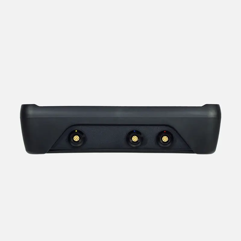 Black electronic device with three gold connectors on white background.