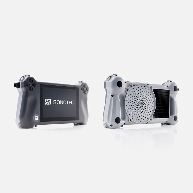Two Sonotec SONASCREEN®2 devices; one shows logo, other shows perforated back.