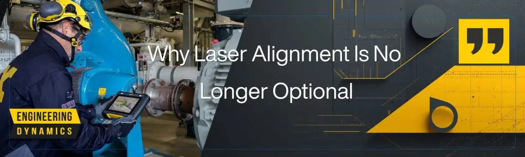 Technician using tablet for laser alignment beside industrial machinery.
